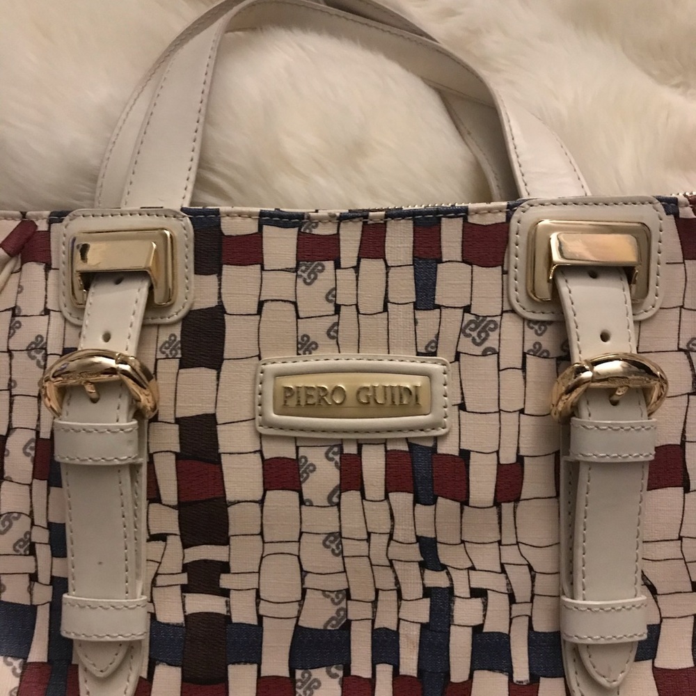 Piero guidi purse